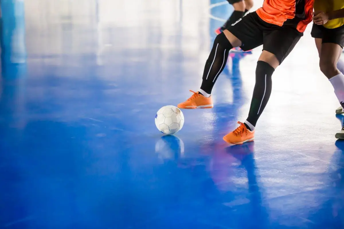 Low section people playing football court (2)